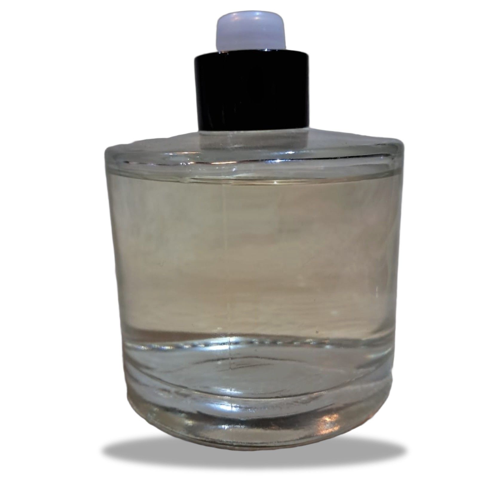 The same glass bottle on a pure white background, the glass still see-through, with a soft shadow